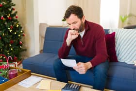 If you've built up debt, please don't ignore bills or letters, and remember that there is support out there for you. Photo: StockAdobe