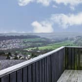 A decked seating area to the rear of the house offers exceptional, far reaching views.