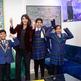 Carlton Junior School headteacher Rizwana Ahmed with pupils after the school was named England’s second best for pupil progress in reading when the latest primary school league tables were published in December 2023.