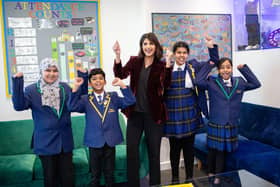 Carlton Junior School headteacher Rizwana Ahmed with pupils after the school was named England’s second best for pupil progress in reading when the latest primary school league tables were published in December 2023.