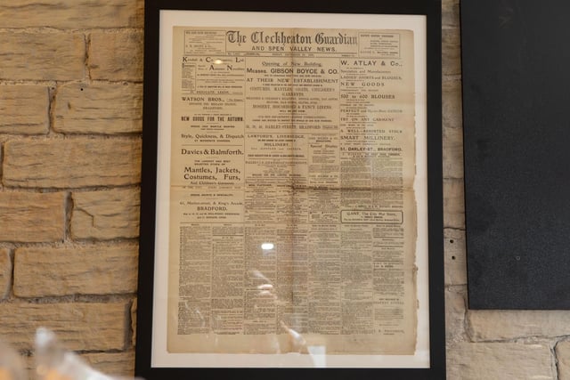 A framed 1905 copy of the Cleckheaton Guardian and Spen Valley News at the new Bosco's of Birkenshaw deli and coffee shop.