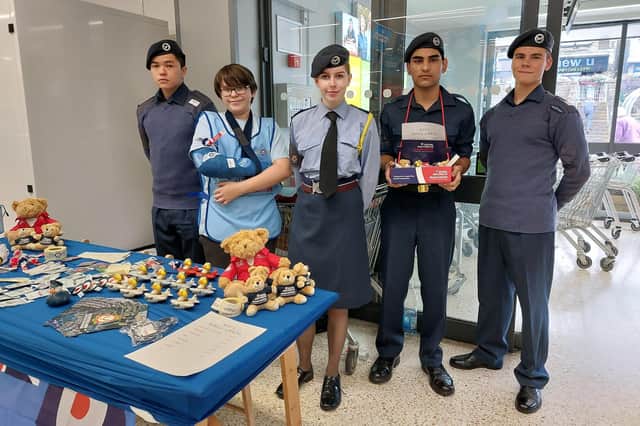 Cadets from 868 Mirfield Squadron manning the Wings Appeal stall at the Co-op in Mirfield, from left: Aiden Lee, Joshua Hinchliffe, Flight Sergeant Katie Ashford, Muhammad Saad and Damian Bednarczyk, while other cadets were collecting at Lidl and on the streets.