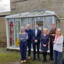 Chair of Friends of Mirfield Library, Cynthia Collinson, with other volunteer members, as well as councillors Martyn Bolt, third from right, and Adam Gregg, third from left, outside Mirfield Library having expressed their “disappointment” at Kirklees Council’s proposals to move Mirfield Library under the management of volunteers.