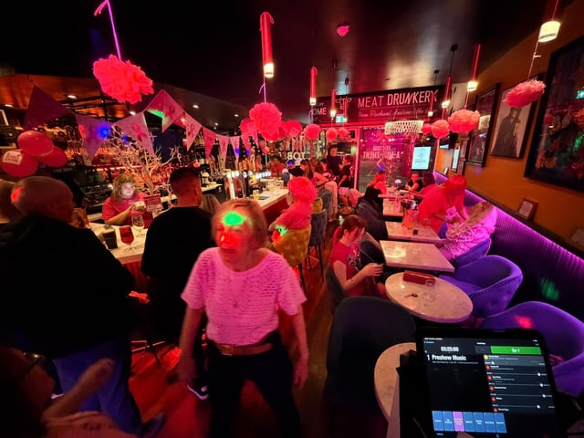 The Meat Drunkery has raised £1,500 for a breast cancer charity after turning everything pink.