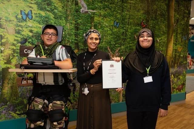 Hazra Jogiyat, with Hasnain and Aqsa, at Fairfield School, has been presented with a Mayor's Award for first Democracy Friendly School within Kirklees