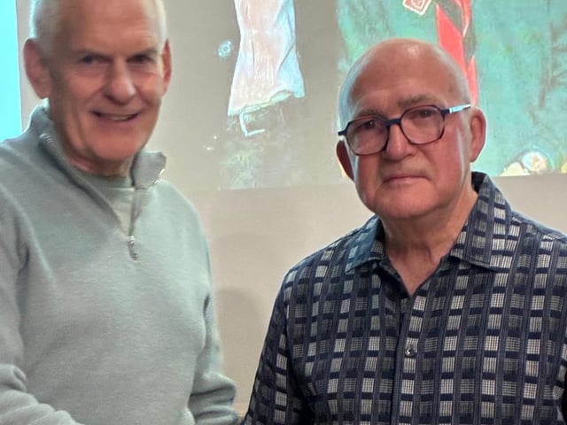 Malcolm Firth receives a retirement gift.