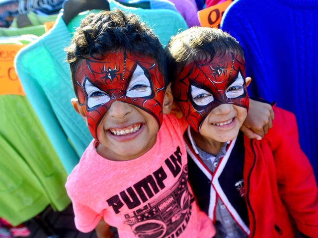 Zain Zaheer and Abdullah Mobeen with their faces painted.