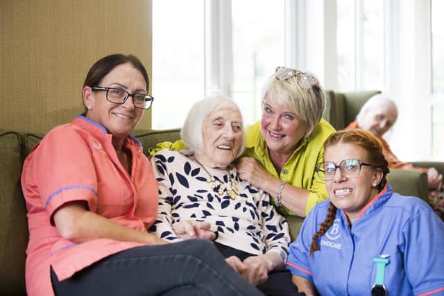 Catherine 'Kitty' Grace, second from left, at Oak Park Care Home, Dewsbury.