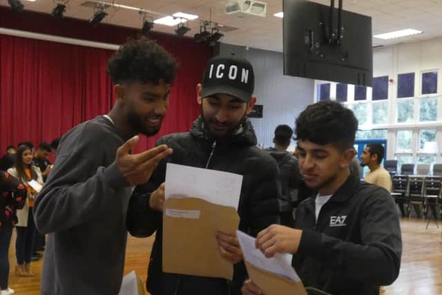 Students at Upper Batley High School celebrate their GCSE results