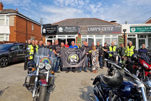 The group outside the Route 62 cafe ahead of their charity bike ride to Settle