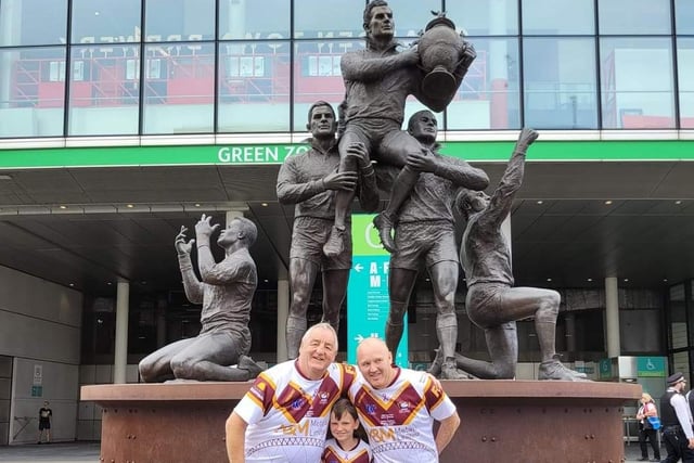 Batley fans in front of the famous statue outside Wembley which remembers five of the all-time greats of the sport in Eric Ashton, Billy Boston, Martin Offiah, Alex Murphy and Gus Risman.