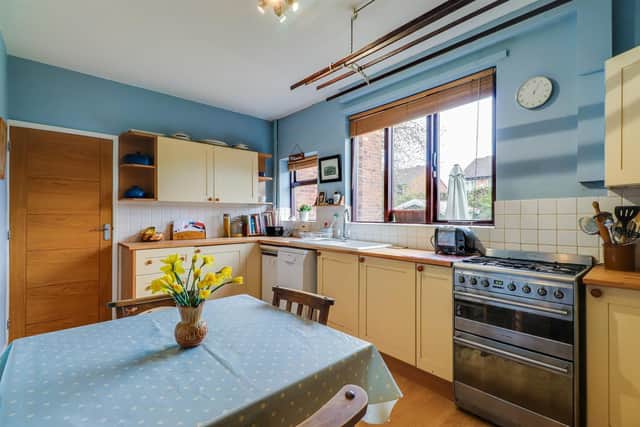 The breakfast kitchen has fitted units and some integrated appliances.
