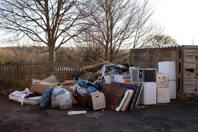 The rubbish that has accumulated behind the terraced houses on Walker Street, Earlsheaton.
