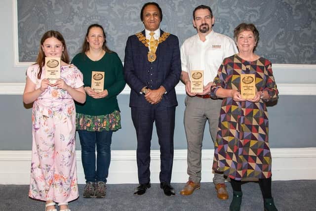 The Mayor of Kirklees, Coun Masood Ahmed with some of this year's winners.