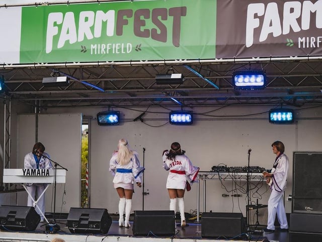 An ABBA tribute band performed for the crowd.