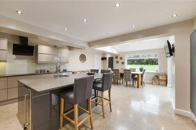 The open plan, fitted kitchen with diner.