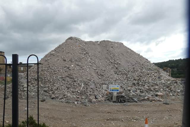 A huge pile of rubble left behind after the reception building was demolished.