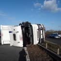 A lorry has overturned on the M62 near Pontefract