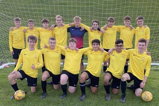 The sixth form boys football team at Heckmondwike Grammar School.