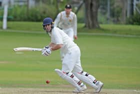 Sam Frankland hit a century to help Woodlands into the Yorkshire Premier League Play-off final.