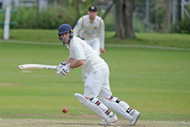 Sam Frankland hit a century to help Woodlands into the Yorkshire Premier League Play-off final.