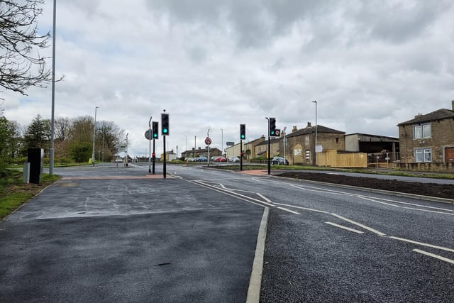The freshly installed traffic signals, to go along with a new road layout, at the accident hotspot junction of Scholes Lane and Walton Lane, have been part of major improvement works by Kirklees Council.