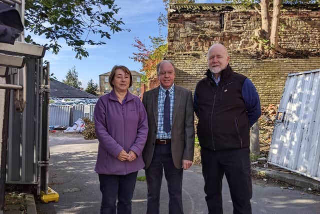 Sue Baker, owner of Greenwoods, Paul Ellis, president and Bruce Bird, secretary of Dewsbury Chamber of Trade at the entrance of the proposed hotel site.