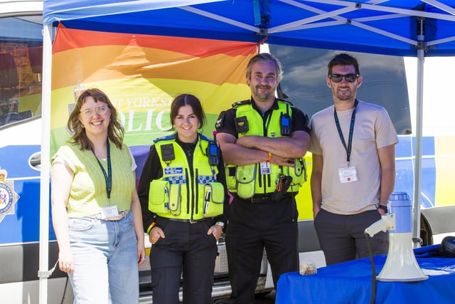 Dewsbury Pride at The Leggers Inn. Marianne Matusz, left, and Tom Brennan, right, from Kirklees Council Year of Music team, with PCSO Myers, second from left, and sergeant Oates, second from right.