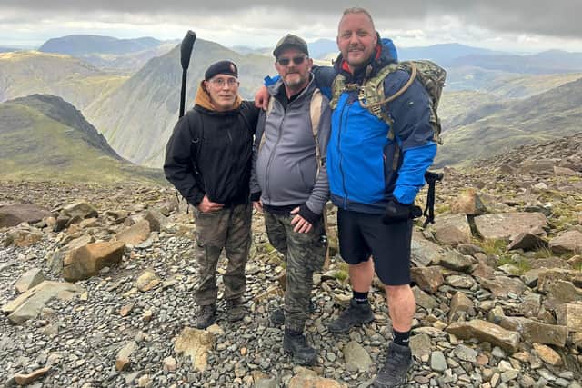 Three veterans have successfully climbed Scafell Pike to raise money and awareness for a mental health charity in Batley.