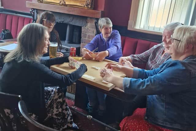 Members having a game of dominoes at The Shears pub in Liversedge.