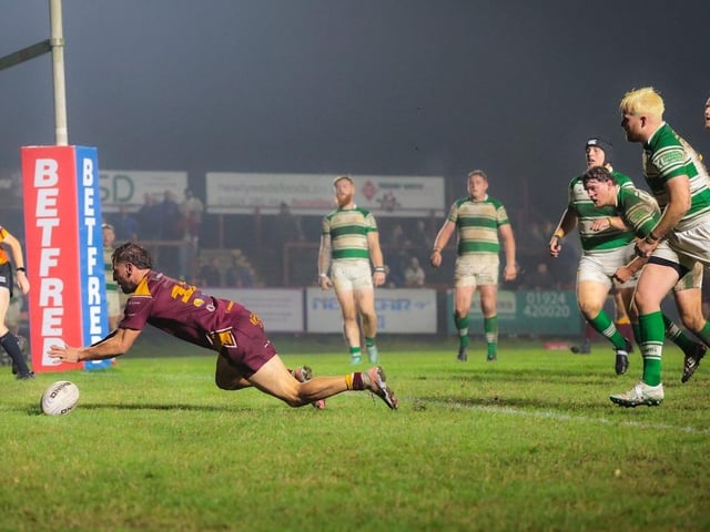Brad Adams scores Dewsbury Moor Maroons' first try against Dewsbury Celtic.