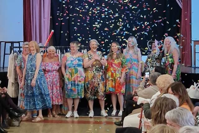 Volunteer models showcasing dresses from Glitterati Boutique