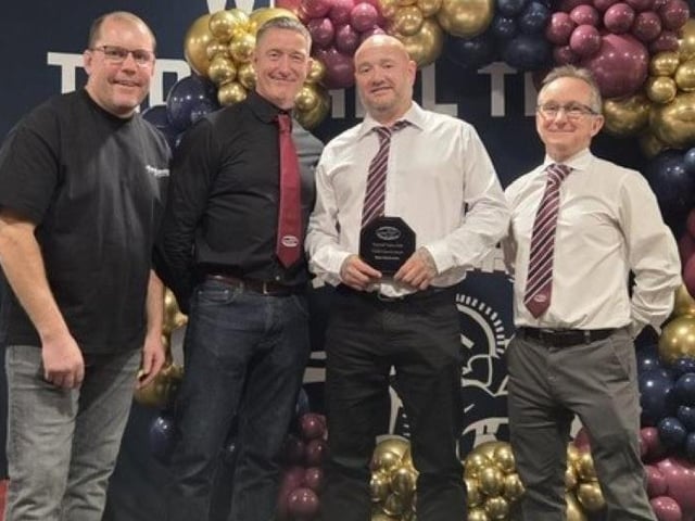 Ryan Hardcastle receives the coach’s special award.