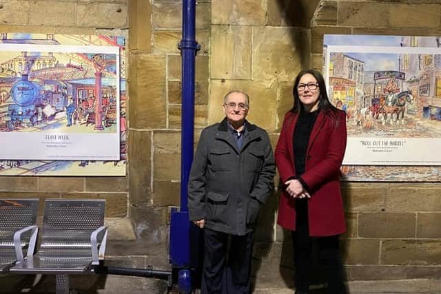 Malcolm East, a Dewsbury-based artist whose ‘fantastic’ paintings have been put on display on Platform 2 of Dewsbury Train Startion, with Sarah Barnes of the West Riding pub on the station.