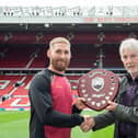Catalan Dragons' Sam Tomkins is awarded the Rugby League Writers and Broadcasters Association Player of the Year award by Ian Laybourn, right, at Old Trafford in 2021