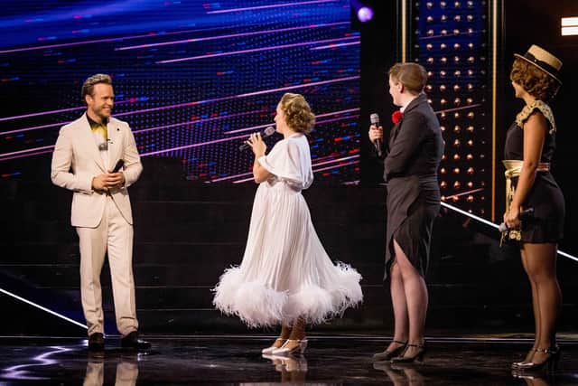 Olly Murs with Natasha, Emily and Shelley as Judy Garland. Picture: Guy Levy/ITV