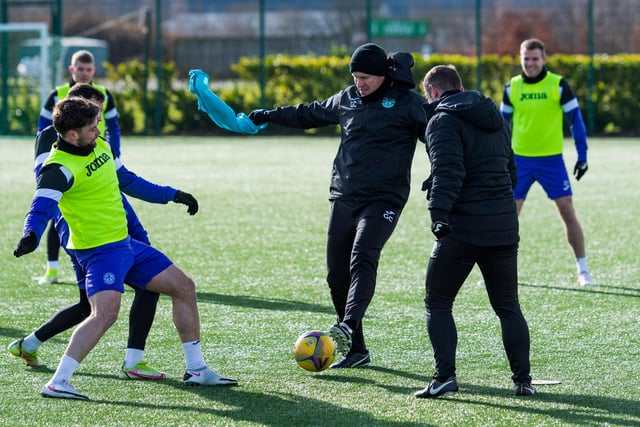 Lewis Stevenson, Gary Caldwell, and Shaun Maloney go at it during training at HTC