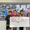 Primary schools in Cleckheaton, Birkenshaw and Scholes have been celebrating after being awarded community grants by Tesco