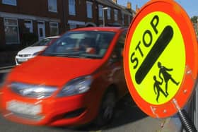 Kirklees Council has confirmed that lollipop ladies and men will still be seen outside the district’s schools after claims their roles were under threat.