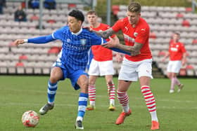 New Liversedge FC signing George Proctor (right) in action for Barnsley U23s against Sheffield Wednesday U23s.