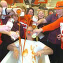 Comic Relief at Sainsbury's Dewsbury in 2009. Pictured is Tim Morris in the bath of beans