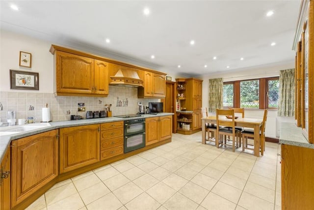 The extensive dining kitchen with its full range of fitted units and appliances.