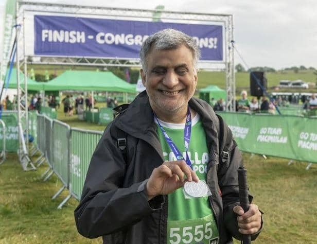 Khalid Hussain, 61, is gearing up for his second walking challenge as he negotiates Snowdon despite having no vision at all.