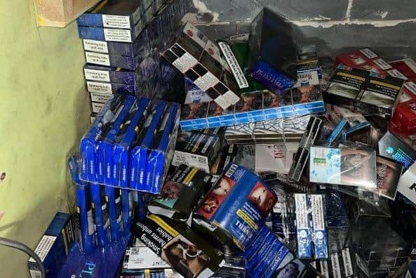 West Yorkshire Police found illegal cigarettes concealed in a false wall and false counter panel at stores in Dewsbury and Mirfield