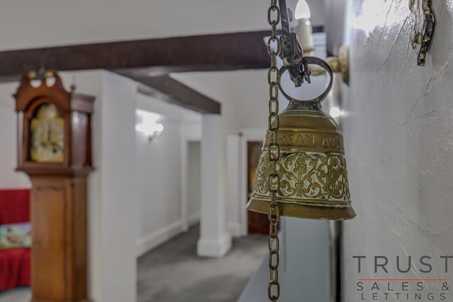 A bell still features in the hallway of the property.