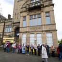 Campaigners formed a 'ring of love' around Cleckheaton Town Hall to demonstrate just how important the building is to them