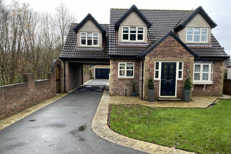 This home, on Parkfield Croft in Mirfield, is on sale with Wilcock priced £600,000.