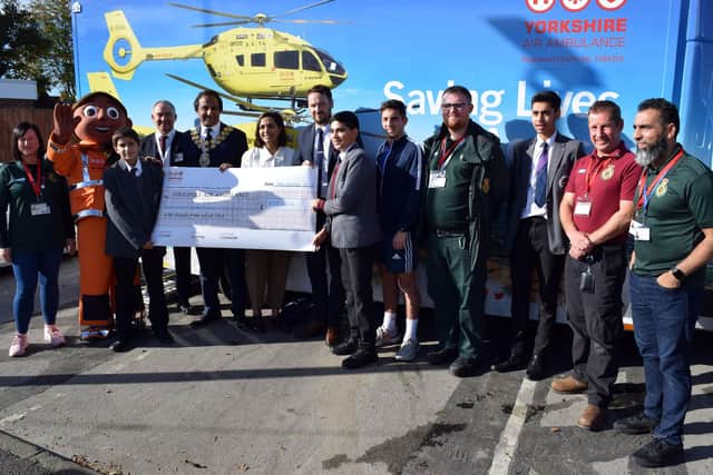 Yorkshire Air Ambulance was presented with a cheque for £518 by Thornhill Community Academy towards the running costs of the air ambulance.