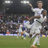 Crysencio Summerville celebrates his dramatic late equaliser against Cardiff City with teammate Ethan Ampadu.
