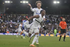 Crysencio Summerville celebrates his dramatic late equaliser against Cardiff City with teammate Ethan Ampadu.